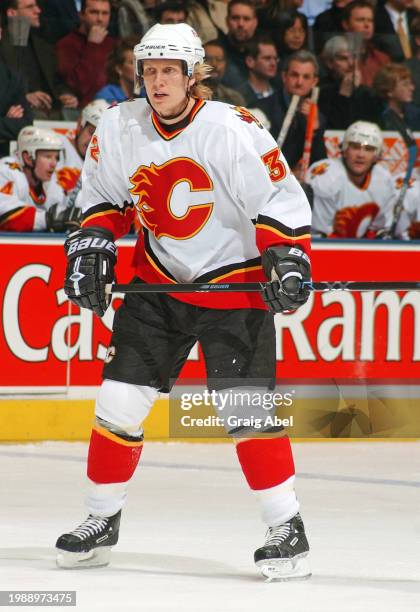 Toni Lydman of the Calgary Flames skates against the Toronto Maple Leafs during NHL game action on January 13, 2004 at Air Canada Centre in Toronto,...