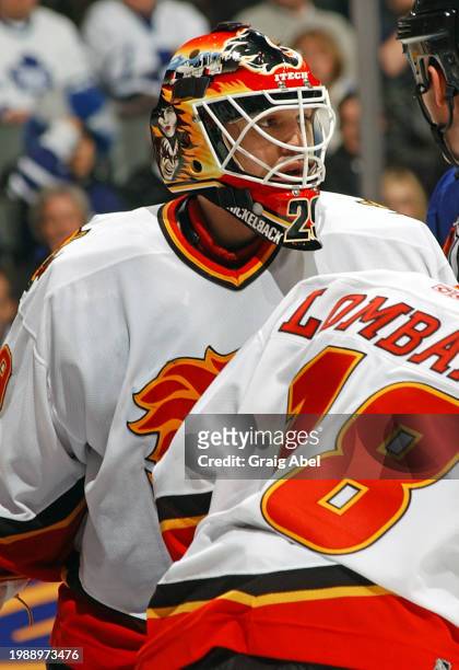 Jamie McLennan of the Calgary Flames skates against the Toronto Maple Leafs during NHL game action on January 13, 2004 at Air Canada Centre in...