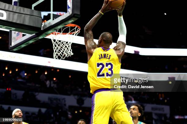 LeBron James of the Los Angeles Lakers dunks the ball during the first half of a game against the Charlotte Hornets at Spectrum Center on February...