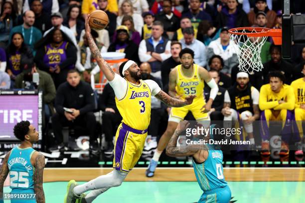 Anthony Davis of the Los Angeles Lakers dunks the ball during the first half of a game against the Charlotte Hornets at Spectrum Center on February...