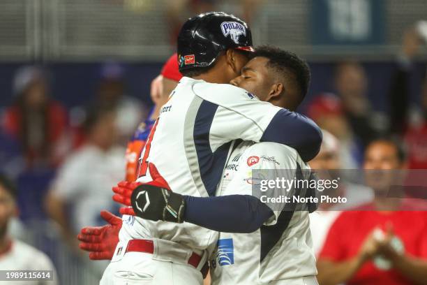 Johnny Yussef Santos of Los Federales de Chiriquí of Panama celebrates the home run hit by Joshwan Wright in the second inning of a game between...