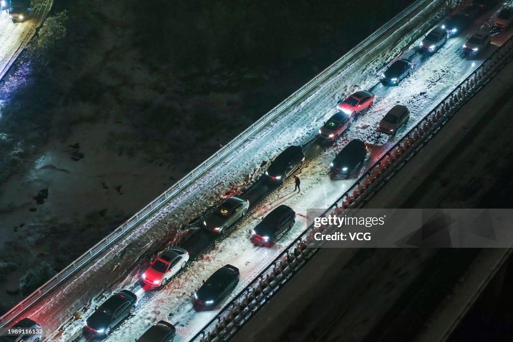 Freezing Rain And Snow Cause Traffic Jam In Wuhan