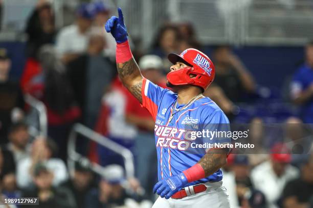 Nelson Velazquez of Puerto Rico's Los Criollos de Caguas celebrates a two-run home run in the third inning of a game between Puerto Rico and Panama...