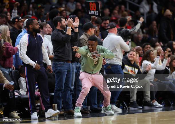 Rapper Boosie Badazz reacts during the fourth quarter between the Atlanta Hawks and the LA Clippers at State Farm Arena on February 05, 2024 in...