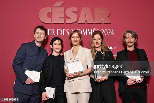 Antoine Reinartz, Milo Machado-Graner, Sandra Hüller, Justine Triet and Swann Arlaud attend the Cesar 2024 - Nominee Dinner at Le Fouquet's on...