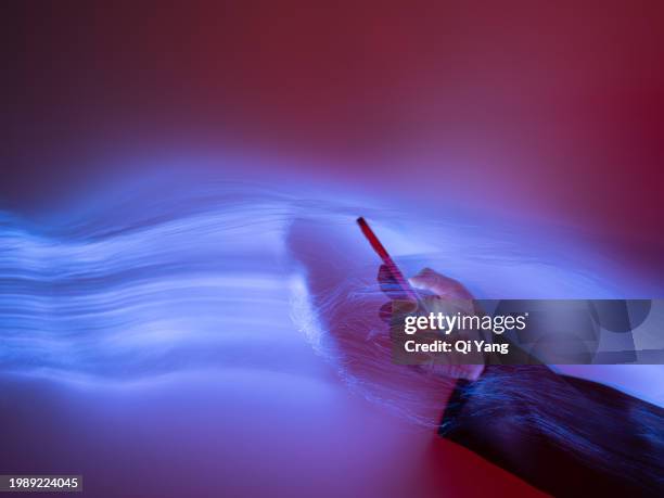close-up of using mobile phone on holographic background - large language model stockfoto's en -beelden