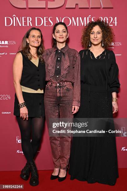 Laetitia Gonzalez, Marion Cotillard and Director Mona Achache attend the Cesar 2024 - Nominee Dinner at Le Fouquet's on February 05, 2024 in Paris,...