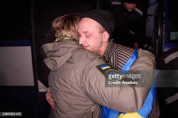 Ukrainian servicemen return to home with bus as Russia and Ukraine exchanged 100 prisoners of war from each side Thursday through mediation by the...