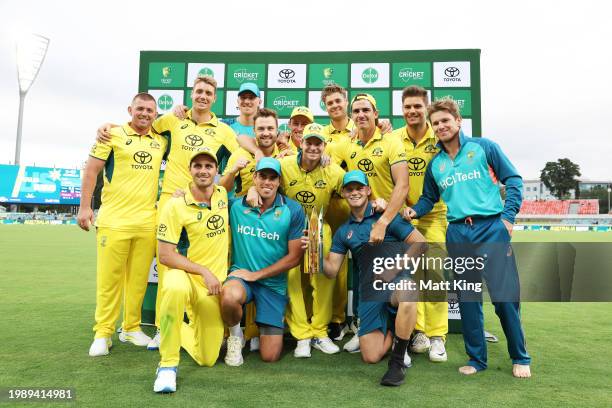 Australia celebrate victory and pose with the ODI Series trophy after game three of the Men's One Day International match between Australia and West...