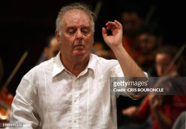 Israeli-Argentinean conductor and pianist Daniel Barenboim rehearses with the Cairo Symphony Orchestra at the Opera House, hours before his first...