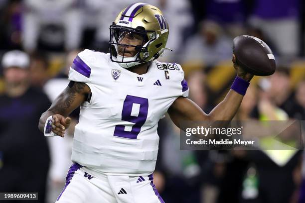 Michael Penix Jr. #9 of the Washington Huskies throws the ball in the first quarter against the Michigan Wolverines during the 2024 CFP National...