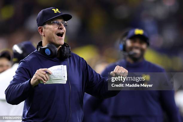 Head coach Jim Harbaugh of the Michigan Wolverines looks on in the first half against the Washington Huskies during the 2024 CFP National...