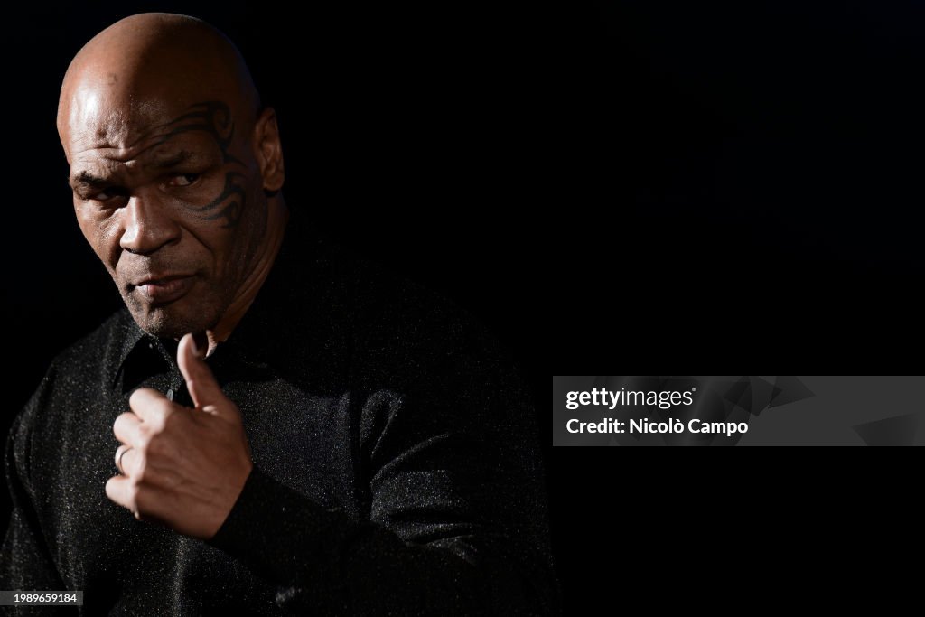 Mike Tyson, American former professional boxer, gestures...