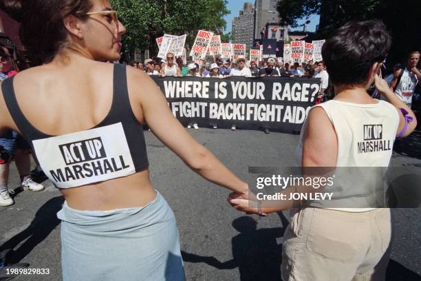 Gay marchers attend the Gay Pride parade and gay rights demonstration in New York, on June 25, 1994. The march to Central Parks marks the 25th...