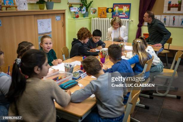 Queen Mathilde of Belgium meets pupils and teachers during a royal visit to Salto primary school in Oud-Turnhout in the context of the Flemish Week...