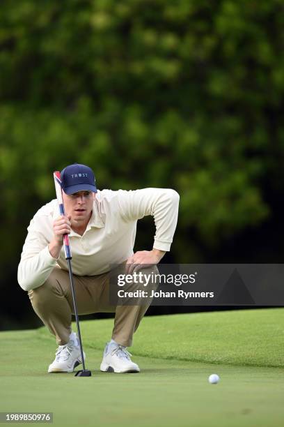 Jeppe Kristian Andersen of Denmark lines up a putt during day two of the Bain's Whisky Cape Town Open at Royal Cape Golf Club on February 9, 2024 in...