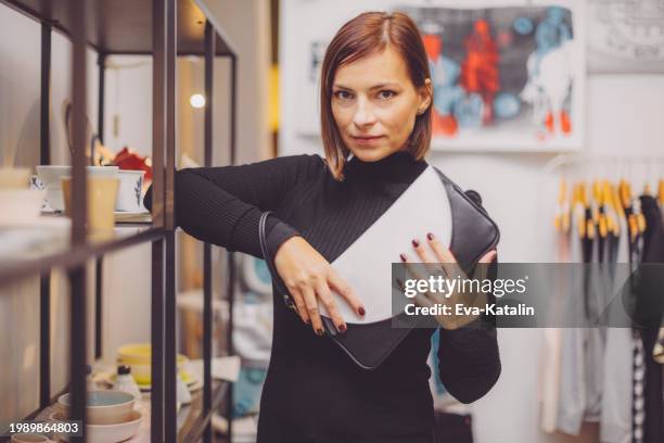 me in my store - designer bag stock pictures, royalty-free photos & images