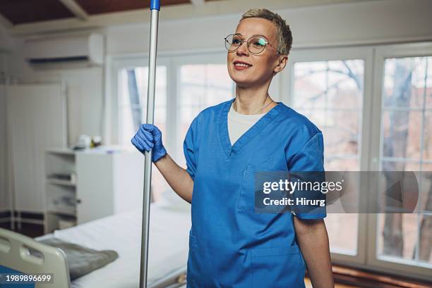 cleaning worker at the hospital ward - hospital cleaner stock pictures, royalty-free photos & images