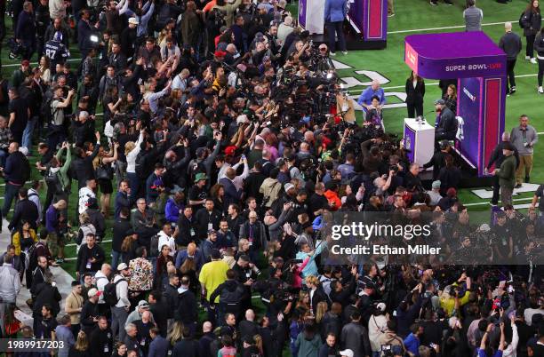 Tight end Travis Kelce of the Kansas City Chiefs speaks to members of the media during Super Bowl LVIII Opening Night at Allegiant Stadium on...