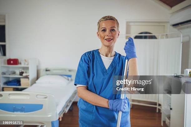 hygiene worker at the hospital ward - hospital-cleaning stock pictures, royalty-free photos & images