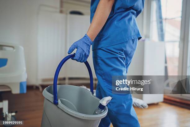 cleaning worker at the hospital ward - hospital cleaner stock pictures, royalty-free photos & images