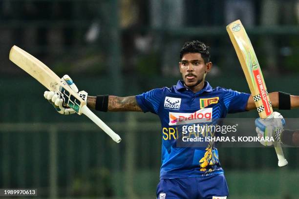Sri Lanka's Pathum Nissanka celebrates after scoring a double century during the first one-day international cricket match between Sri Lanka and...