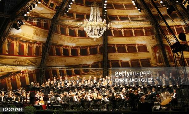The conductor and pianist Daniel Barenboim conducts Milan's La Scala opera compagny during a free openair concert of Verdi's Requiem attended by some...