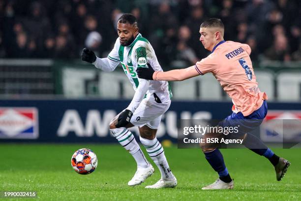 Leandro Bacuna of FC Groningen battles for possession with Kristoffer Petersson of Fortuna Sittard during the TOTO KNVB Cup Quarter Final match...