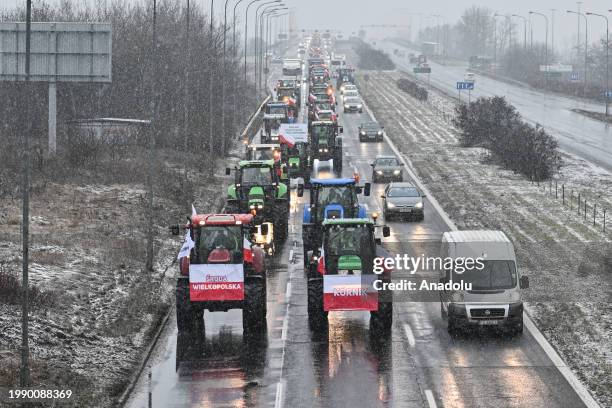 Hundreds of farmers drive their tractors on the highway towards the city center during a national protest against EU agricultural reforms in Poznan,...