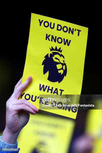 Everton fans display banners aimed at the Premier League during the Premier League match between Everton FC and Tottenham Hotspur at Goodison Park on...