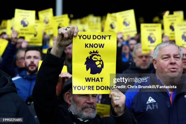 Everton fans display banners aimed at the Premier League during the Premier League match between Everton FC and Tottenham Hotspur at Goodison Park on...