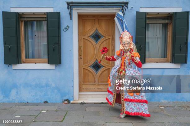 Masked reveler poses for a portrait at the island of Burano during the Venice Carnival 2024 on February 06, 2024 in Venice, Italy. The Venice...