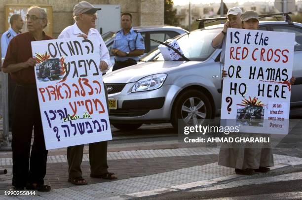 Jewish settlers demonstrate against Hamas legislators held-up for the past 67 days inside the Red Cross offices in Israeli annexed east Jerusalem, on...