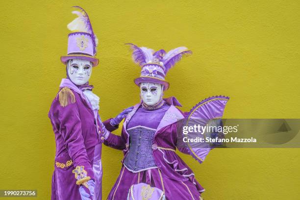 Masked revelers pose for a portrait at the island of Burano during the Venice Carnival 2024 on February 06, 2024 in Venice, Italy. The Venice...