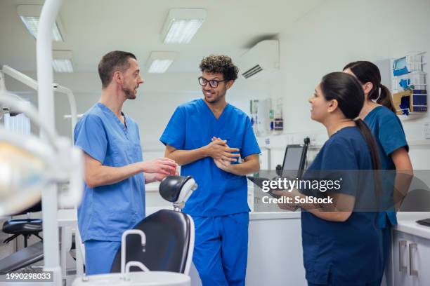 dentists brainstorming - dentistry stock pictures, royalty-free photos & images