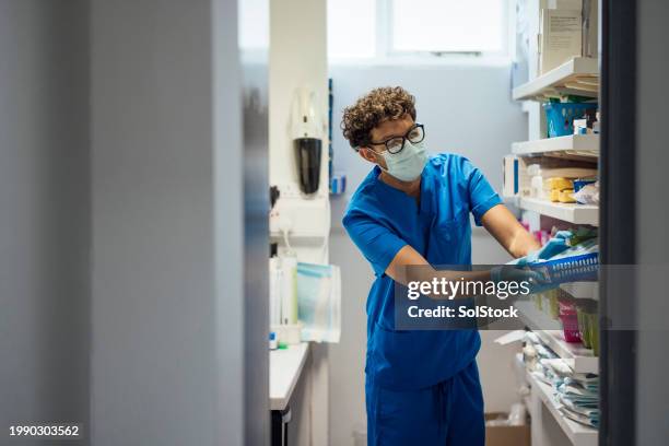 medication stock room organisation - surgical mask and gloves stock pictures, royalty-free photos & images