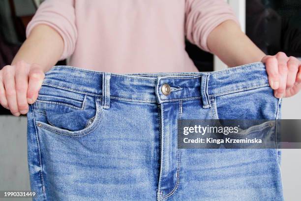 jeans - pink pants stock pictures, royalty-free photos & images