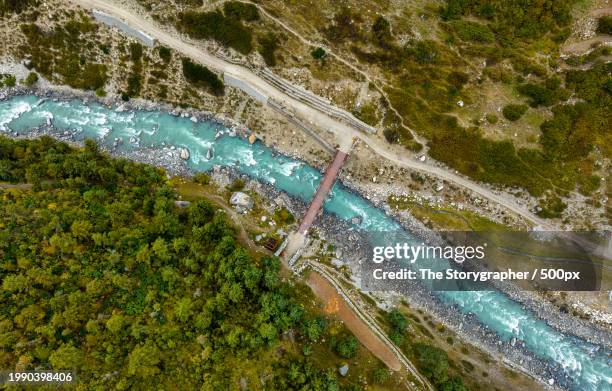 high angle view of bridge over sea - the storygrapher fotografías e imágenes de stock