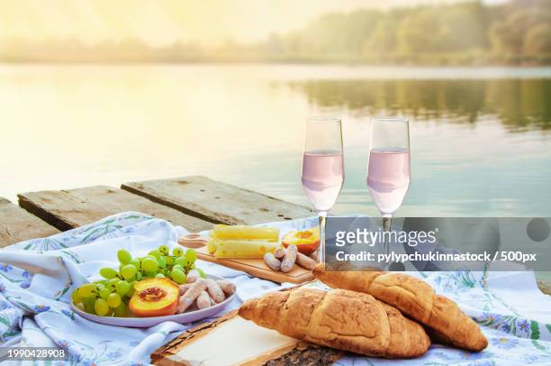 close-up of food and drink on table - cheese and champagne stock pictures, royalty-free photos & images