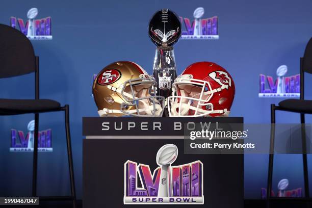 General view of the Vince Lombardi Trophy with the Kansas City Chiefs helmets before a press conference ahead of Super Bowl LVIII at Allegiant...