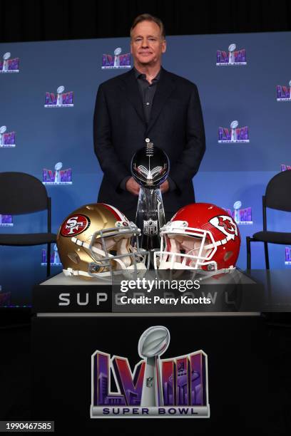 Commissioner Roger Goodell pose with the Vince Lombardi Trophy during a press conference before Super Bowl LVIII at Allegiant Stadium on February 5,...