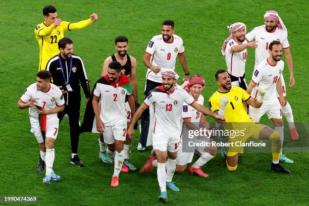 Players of Jordan celebrate victory following the AFC Asian Cup semi final match between Jordan and South Korea at Ahmad Bin Ali Stadium on February...