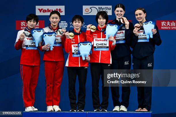 Silver Medalists, Jin Mi Jo and Mi Rae Kim of Team Democratic People's Republic of Korea, Gold Medalists, Yuxi Chen and Hongchan Quan of Team...