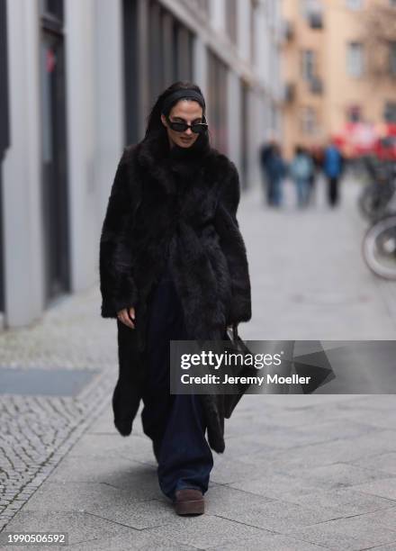 Anna Winter seen wearing Linda Farrow x The Attico black sunglasses, Gant dark brown fake fur long coat, Skims brown long sleeve top, closed dark...