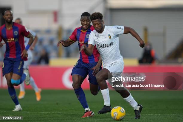 Ze Luis of SC Farense plays against Dario Essugo of GD Chaves during the Liga Portugal Bwin match between GD Chaves and SC Farense on February 4,...