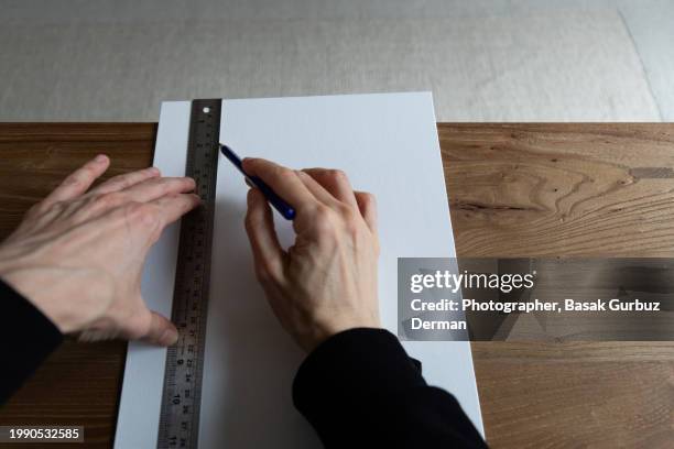 Person Measuring With Ruler 8,013 Hand Holding Ruler Stock Photos, High-Res Pictures, and Images ...