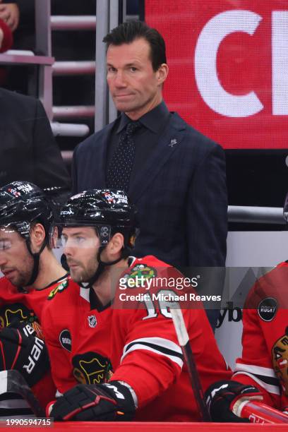 Head coach Luke Richardson of the Chicago Blackhawks looks on against the St. Louis Blues during the first period at the United Center on December...