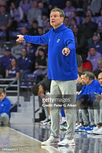 Head coach Bill Self of the Kansas Jayhawks calls out instructions against the Kansas State Wildcats in the first half at Bramlage Coliseum on...