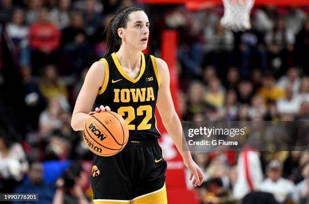 Caitlin Clark of the Iowa Hawkeyes handles the ball against the Maryland Terrapins at Xfinity Center on February 03, 2024 in College Park, Maryland.