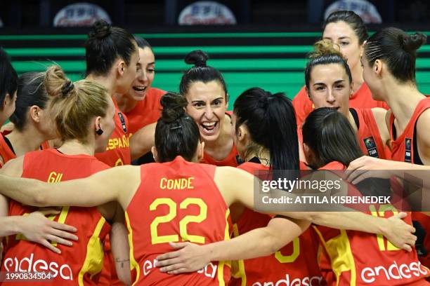 Spanish players celebrate their victory over Canada after the 2024 FIBA Women's Olympic qualifying tournament basketball match between Canada and...